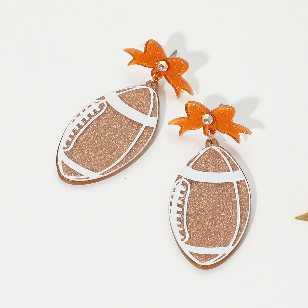 Resin Football Bow Earrings - Calendar ClosetResin Football Bow EarringsCalendar Closet